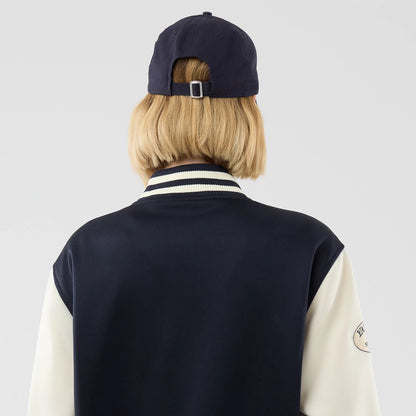 The model is wearing this MLB Jersey Bomber New York Yankees Jacket in navy. 8