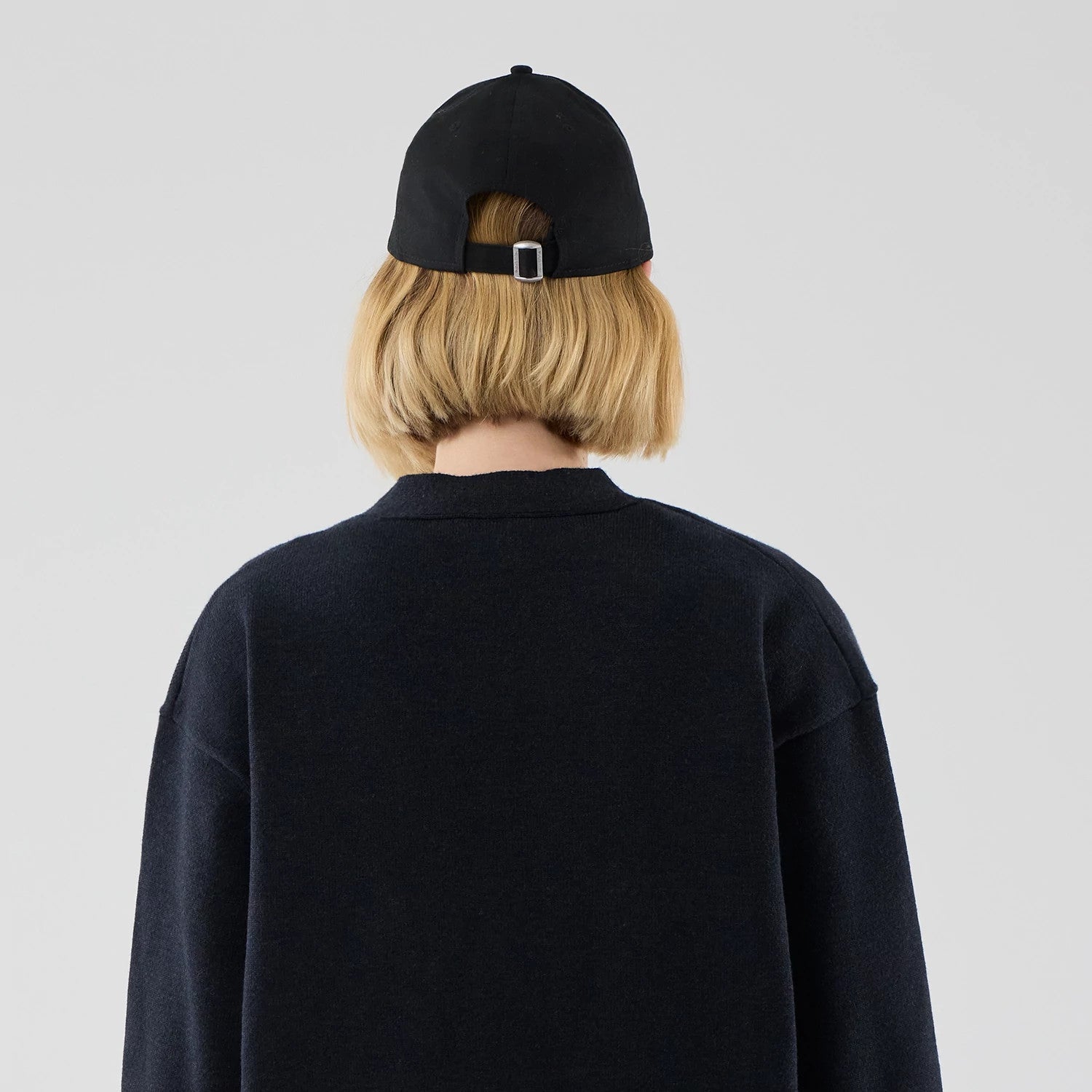 The model is wearing this New Era Heritage Cardigan in navy. 8