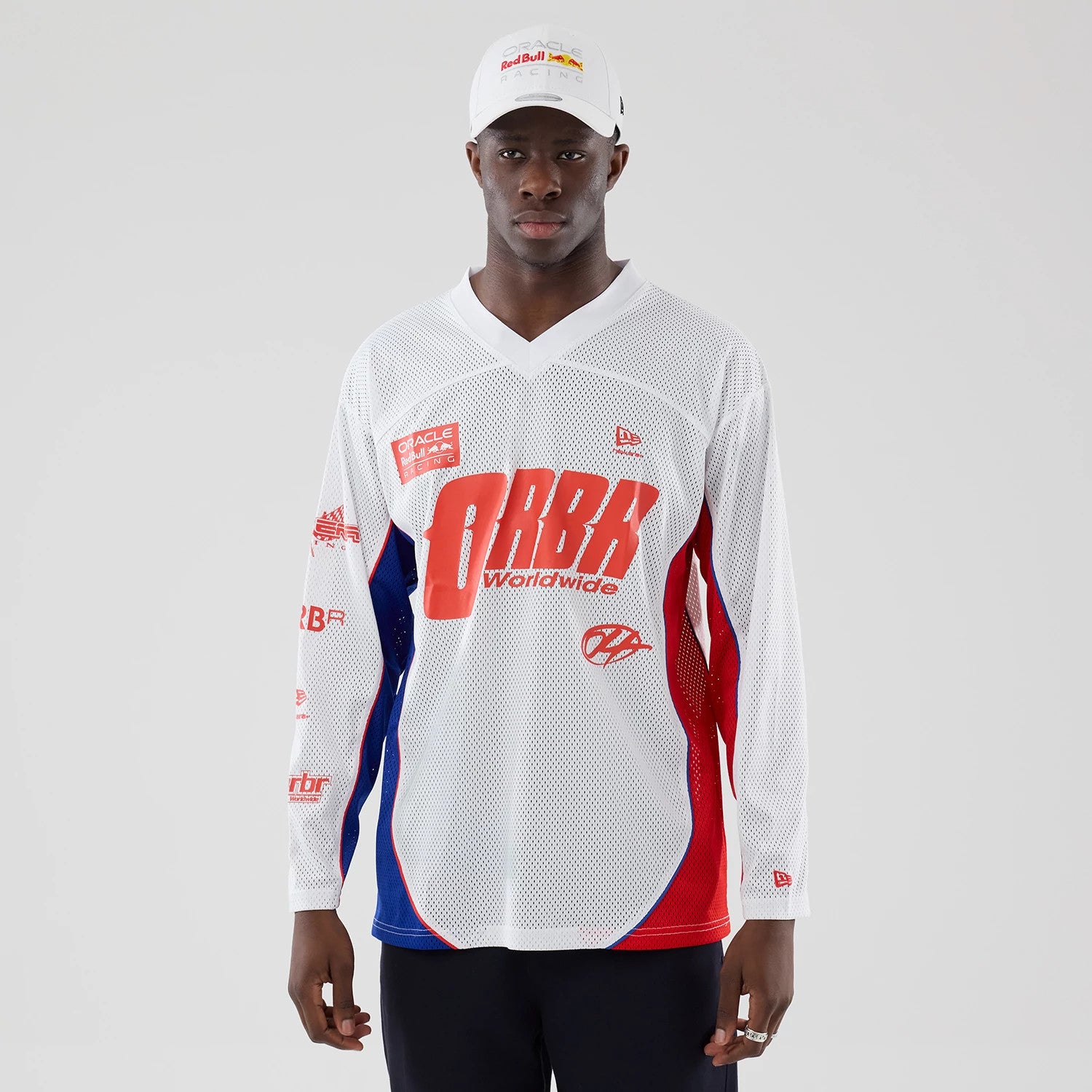 The model is wearing this Red Bull Racing Hockey Jersey in white. 1