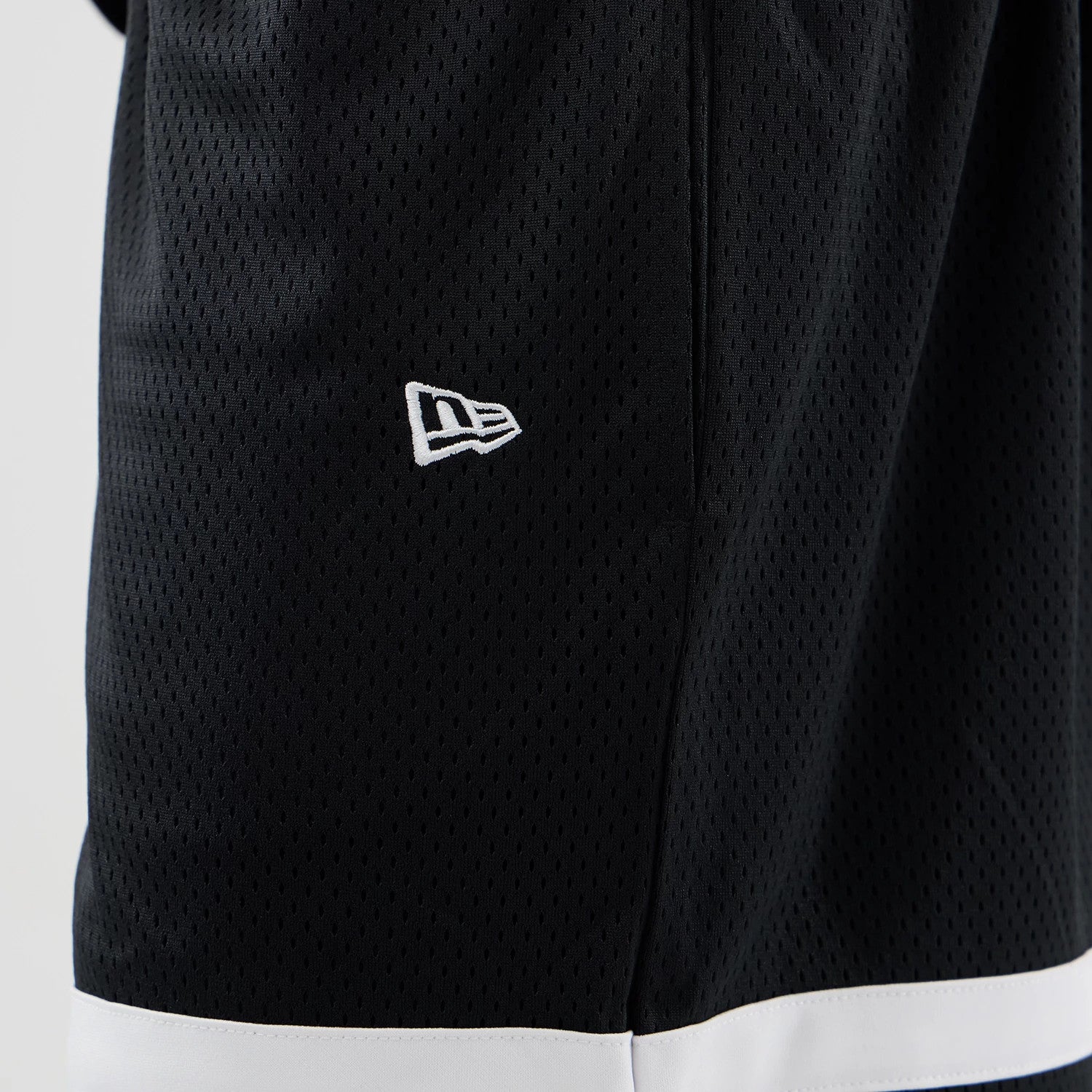 The model is wearing these MLB Mesh LA Dodgers Oversized Shorts in black. 5