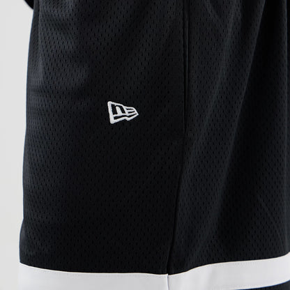 The model is wearing these MLB Mesh LA Dodgers Oversized Shorts in black. 5