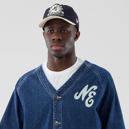 The model is wearing this New Era Denim Worker Jacket in dark blue. 6