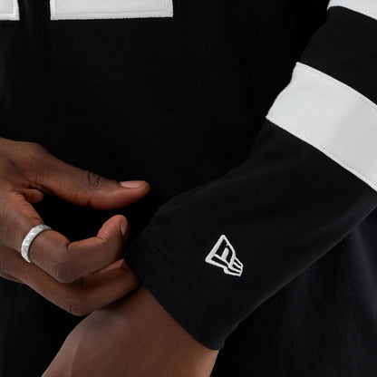 The model is wearing this MLB LA Dodgers Oversized Long Sleeve T-Shirt in black. 7