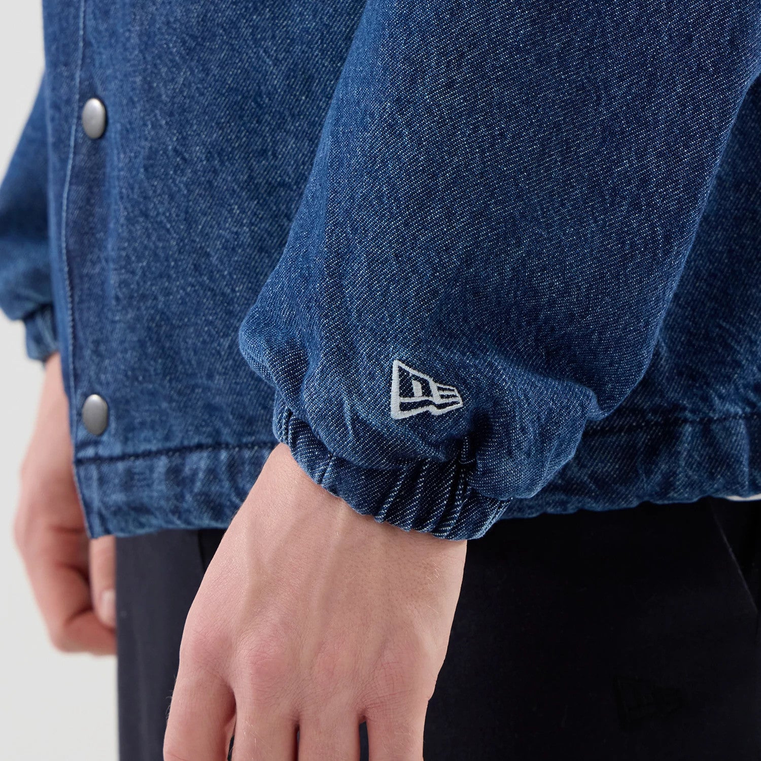 The model is wearing this MLB Coaches LA Dodgers Jacket in dark blue. 5