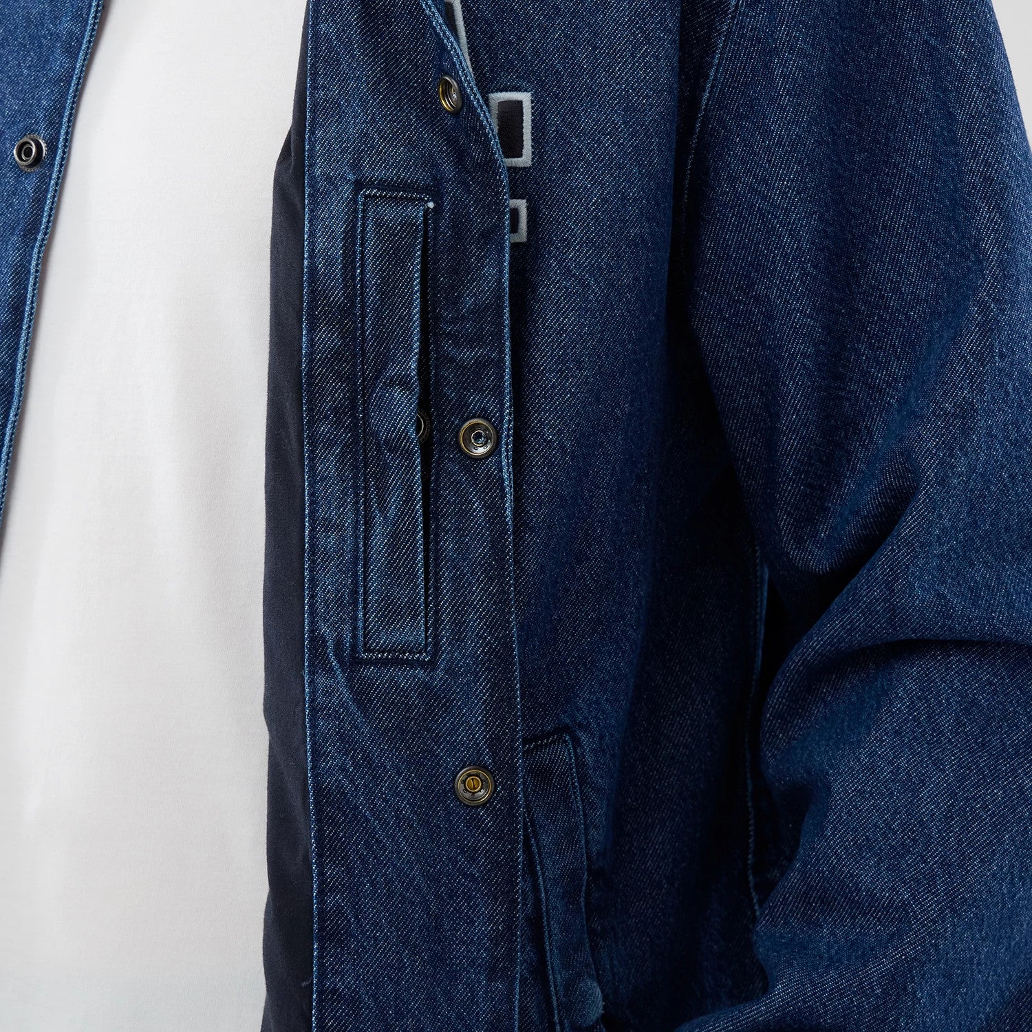 The model is wearing this MLB Coaches LA Dodgers Jacket in dark blue. 6
