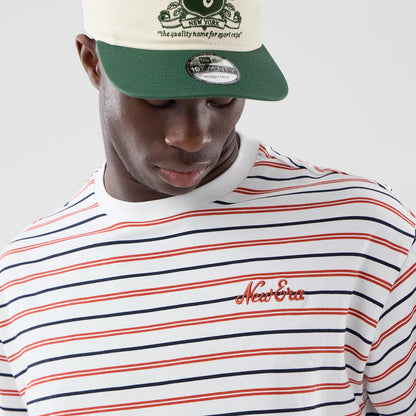 The model is wearing this New Era Stripe Oversized T-Shirt in white. 5