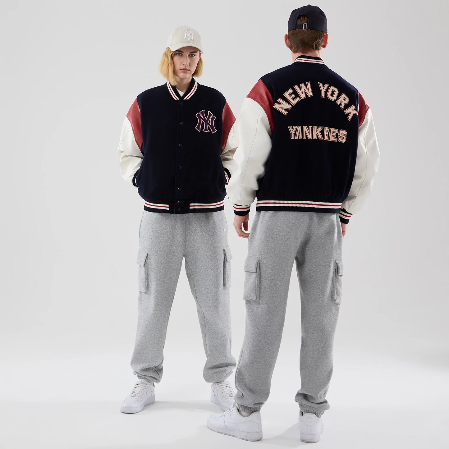 The model is wearing this MLB Varsity New York Yankees Jacket in navy. 1