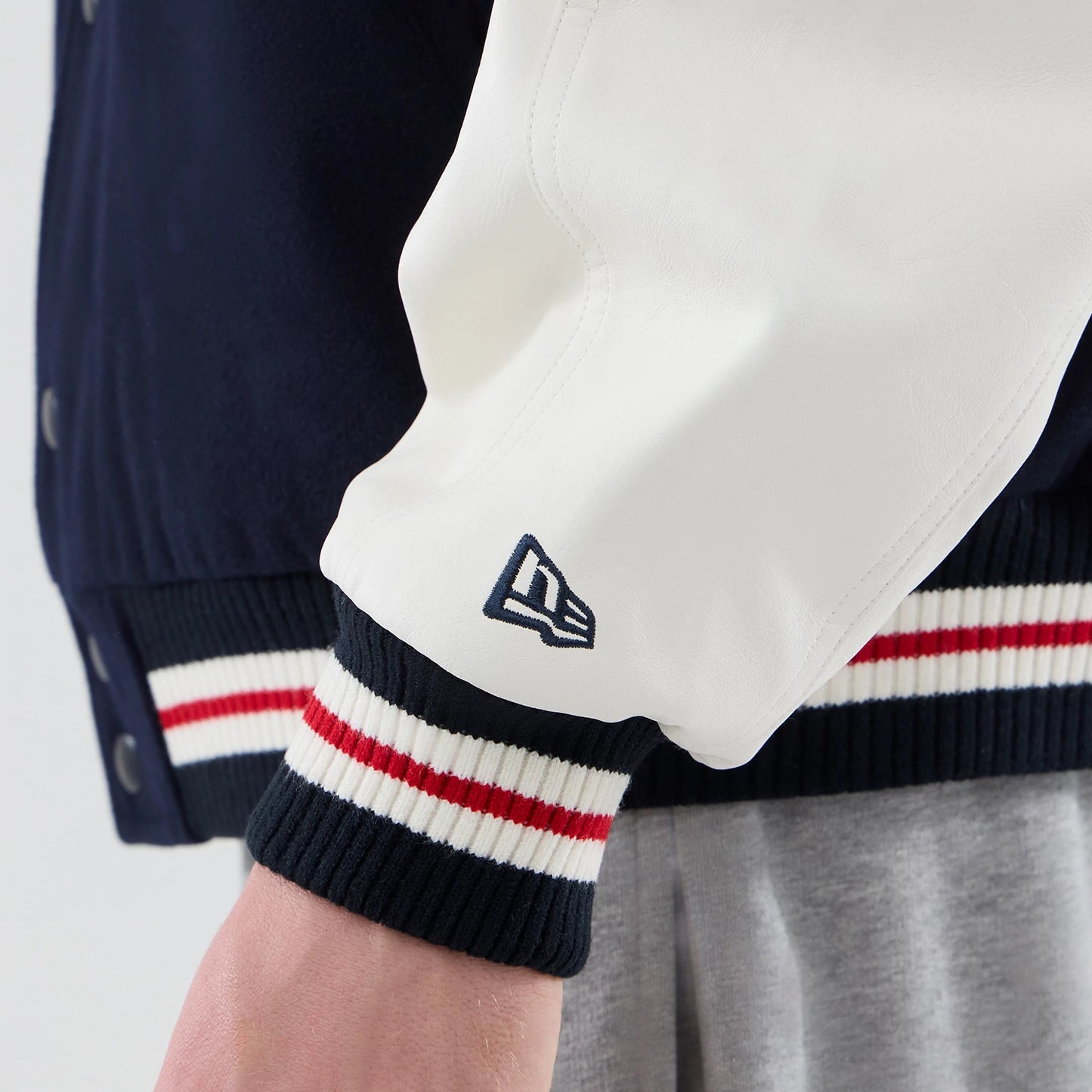 The model is wearing this MLB Varsity New York Yankees Jacket in navy. 7