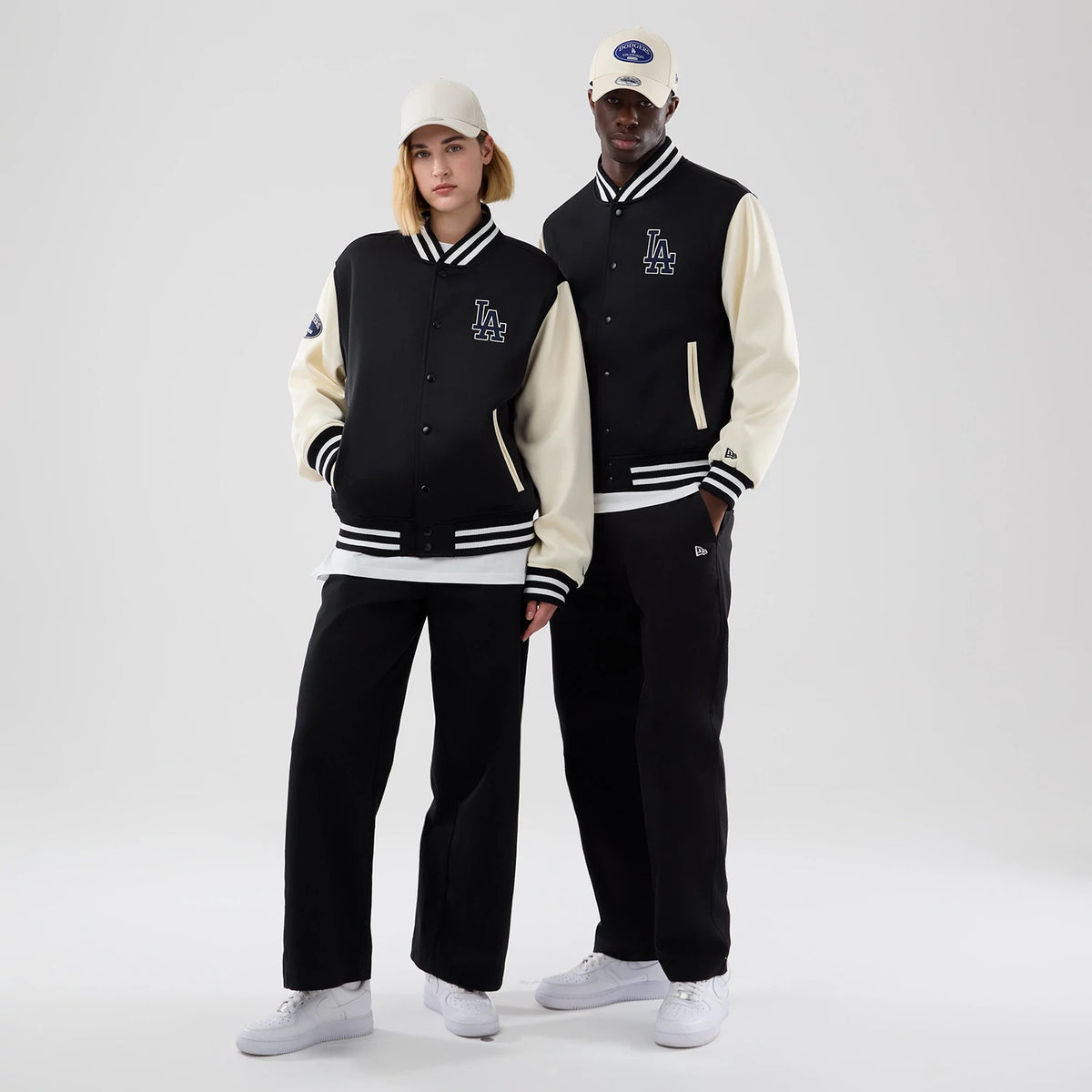 The model is wearing this MLB Jersey Bomber LA Dodgers Jacket in black. 1