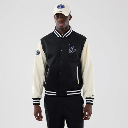 The model is wearing this MLB Jersey Bomber LA Dodgers Jacket in black. 3