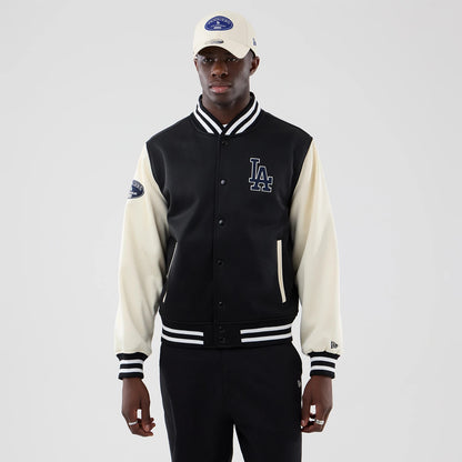 The model is wearing this MLB Jersey Bomber LA Dodgers Jacket in black. 3