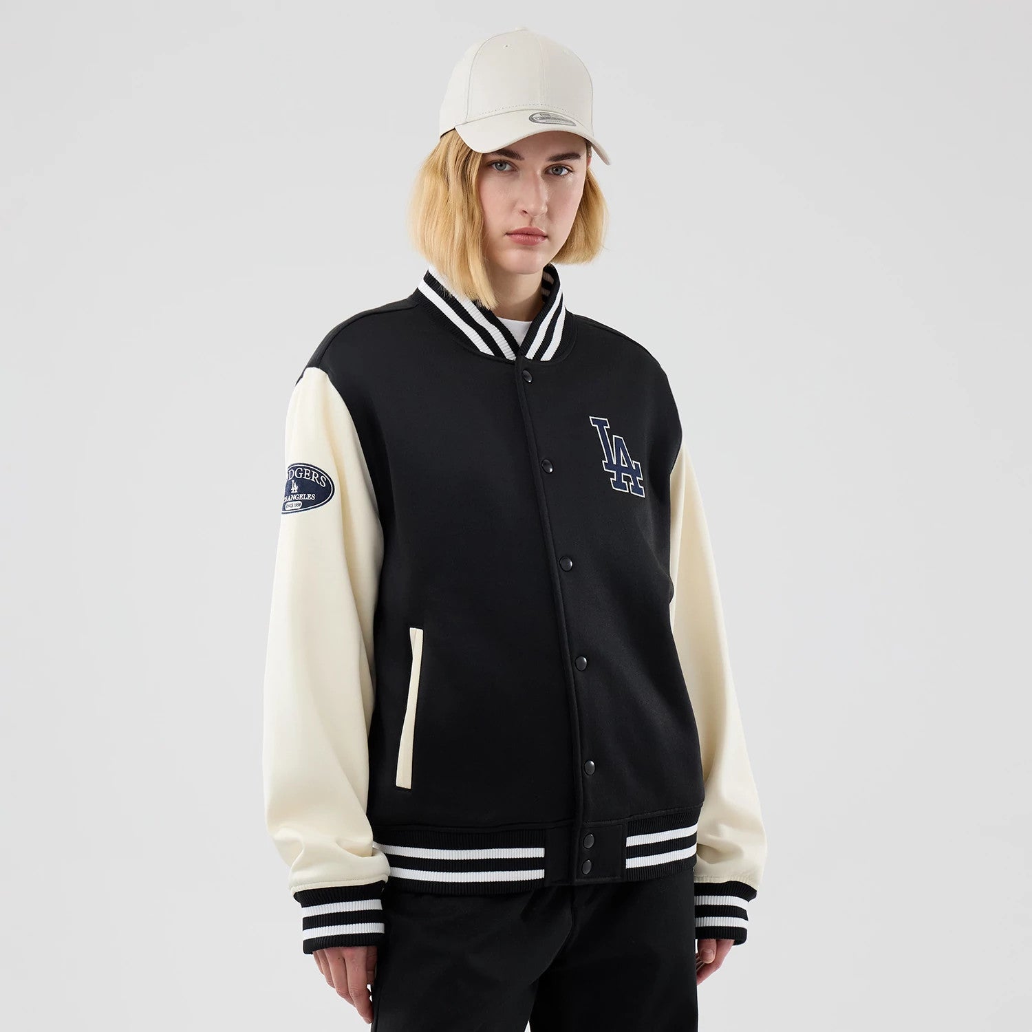 The model is wearing this MLB Jersey Bomber LA Dodgers Jacket in black. 4