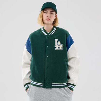 The model is wearing this MLB Varsity LA Dodgers Jacket in dark green. 4