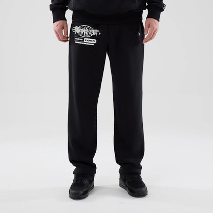 The model is wearing these MLB Logo Graphic New York Yankees Straight Leg Joggers in black. 1
