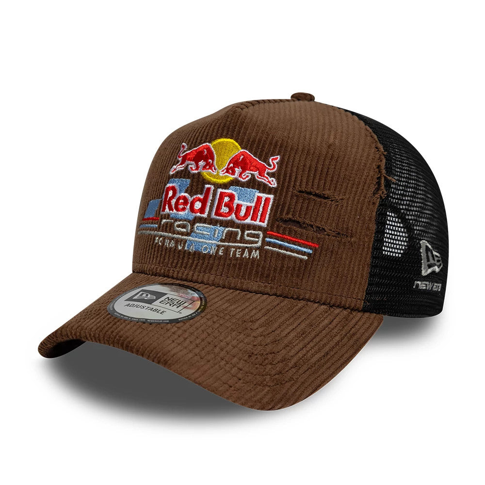 Red Bull Racing Distressed Cord Brown New Era 9FORTY A-Frame Trucker Adjustable Cap, front view showing a multicoloured embroidered logo on the brown cord front panels, black mesh on the back, and a 9FORTY size sticker on the brown visor.