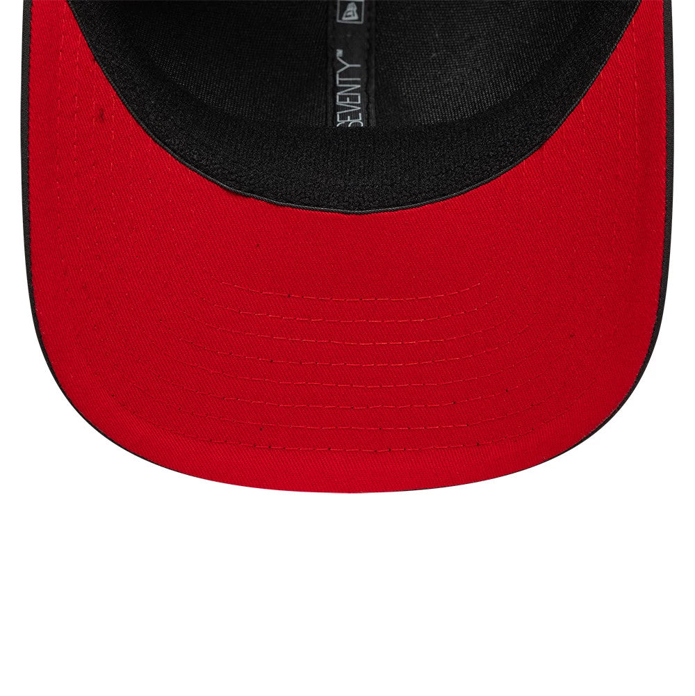 AC Milan Featherweight Poly Black New Era 9SEVENTY Stretch Snap Adjustable Cap, inside view showing the red undervisor and black sweatband, along with New Era 9SEVENTY branded taping running across the interior of the crown.
