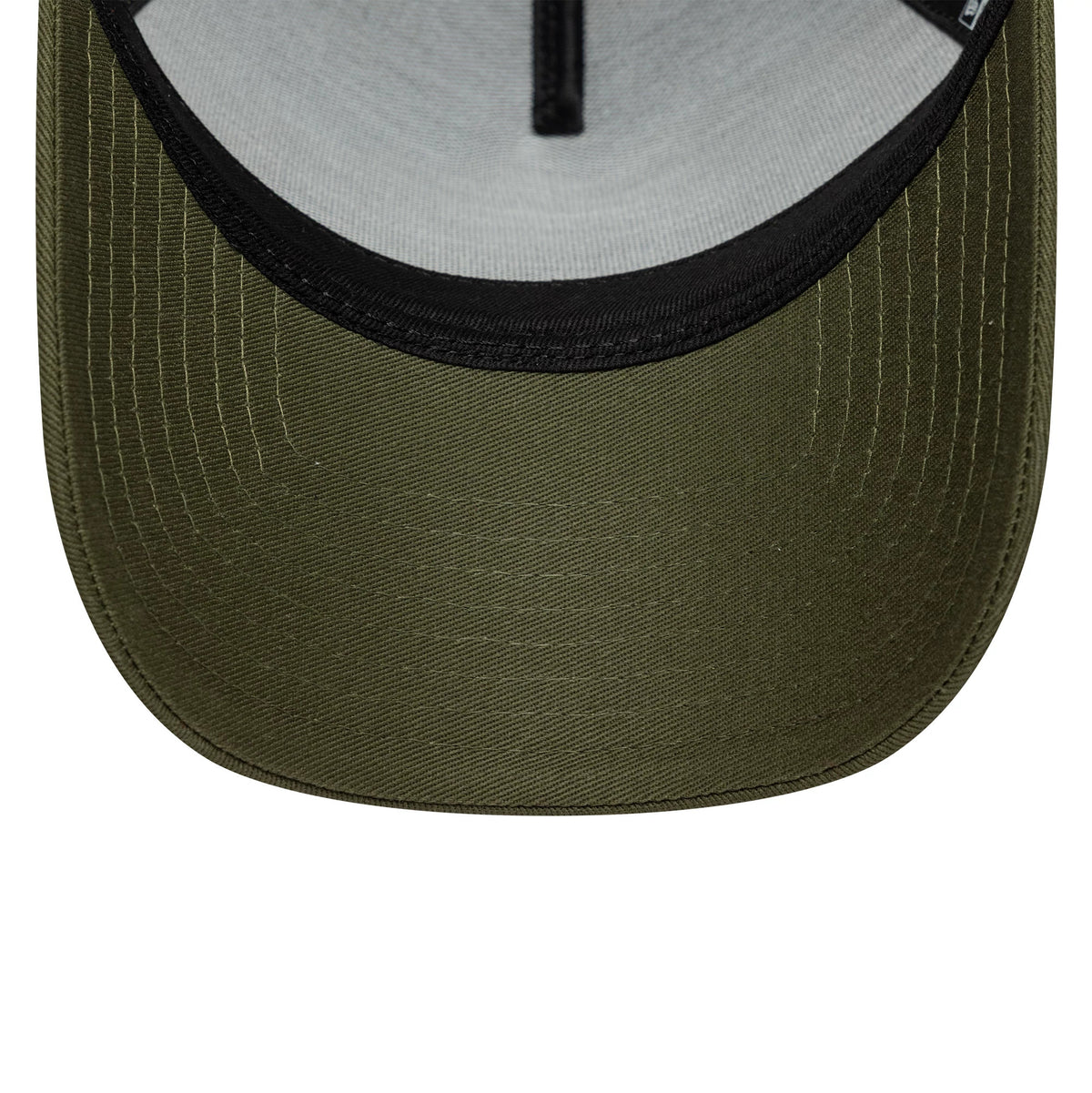 Ducati Motor Core Green New Era 9FORTY E-Frame Trucker Adjustable Cap, inside view showing the curved green visor with black trim, light grey undervisor, and black taping along the centre seam.