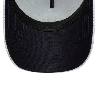 Tottenham Hotspur FC Pattern Knit White New Era 9FORTY E-Frame Trucker Adjustable Cap, inside view showing a light grey sweatband, a black undervisor contrasting with white stitching, and a black centre band running through the crown.