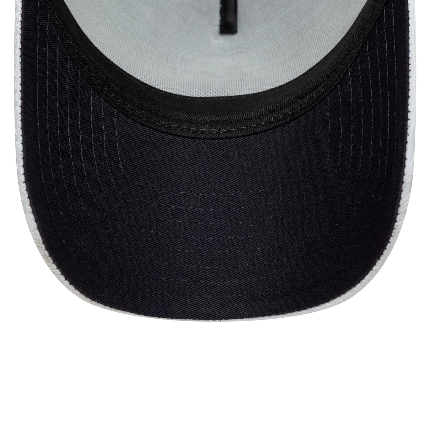 Pictured is this Tottenham Hotspur FC Pattern Knit 9FORTY E-Frame Trucker cap in white. 2