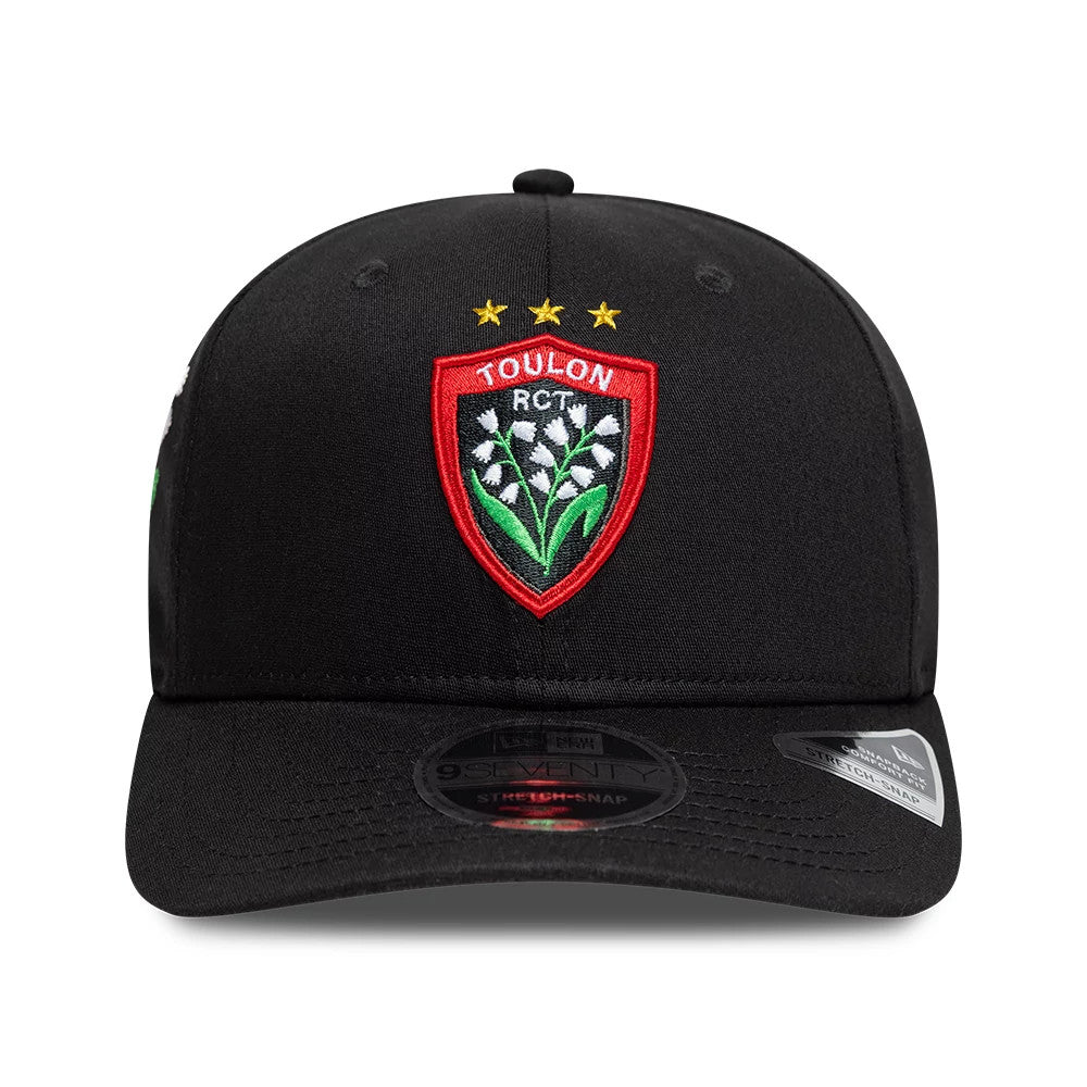 Pictured is this Rugby Club Toulon Lily 9SEVENTY Stretch Snap cap in black. 2