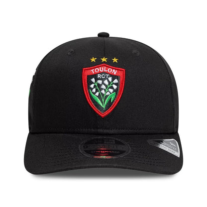 Pictured is this Rugby Club Toulon Lily 9SEVENTY Stretch Snap cap in black. 2