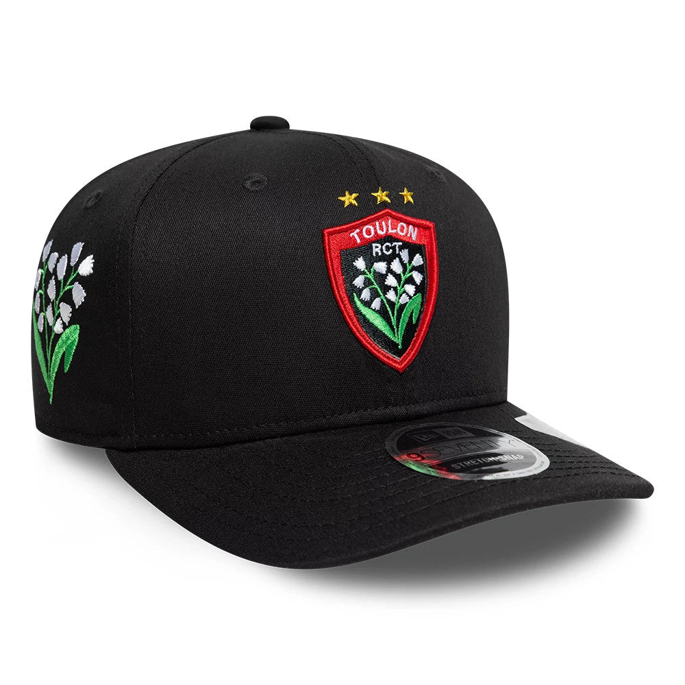 Pictured is this Rugby Club Toulon Lily 9SEVENTY Stretch Snap cap in black. 1