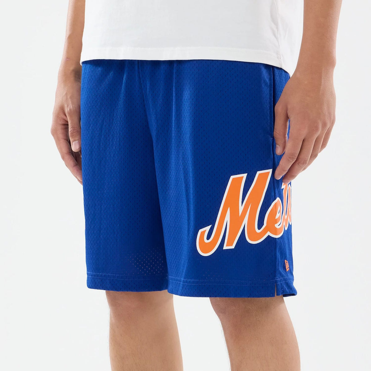 The model is wearing these MLB Evergreen New York Mets Shorts in blue. 4