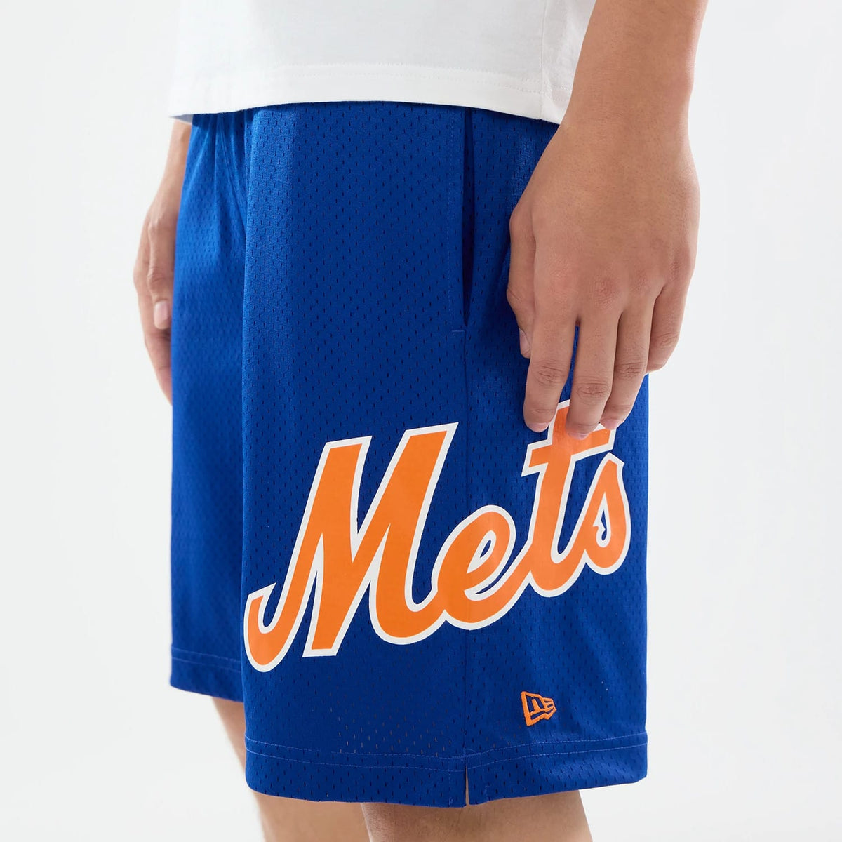 The model is wearing these MLB Evergreen New York Mets Shorts in blue. 6