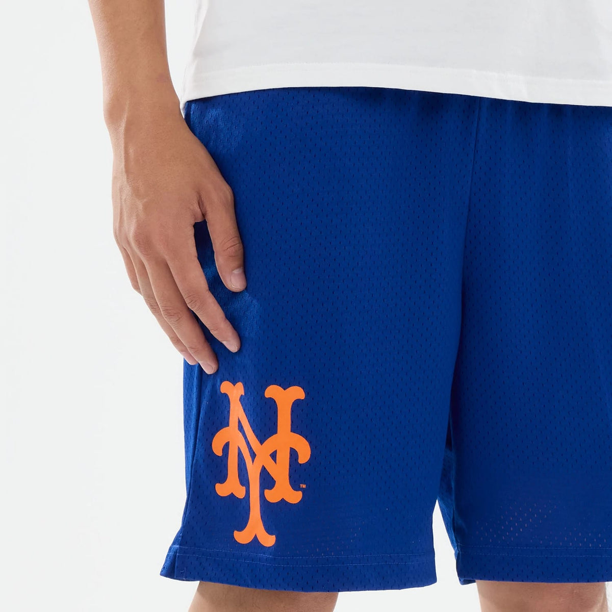 The model is wearing these MLB Evergreen New York Mets Shorts in blue. 3