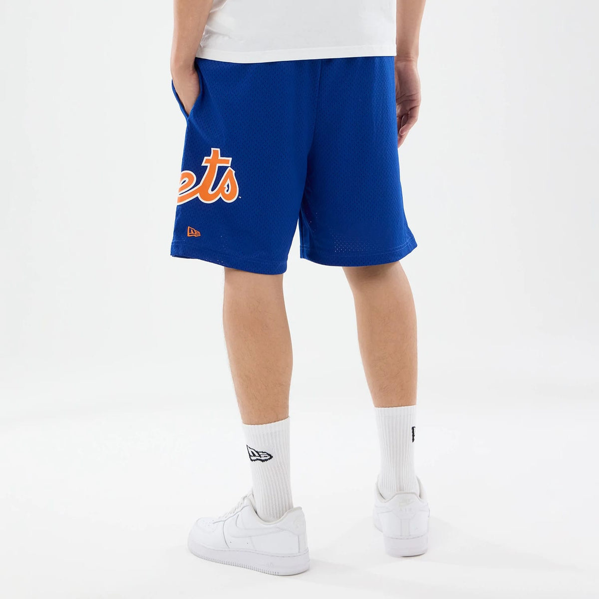 The model is wearing these MLB Evergreen New York Mets Shorts in blue. 2