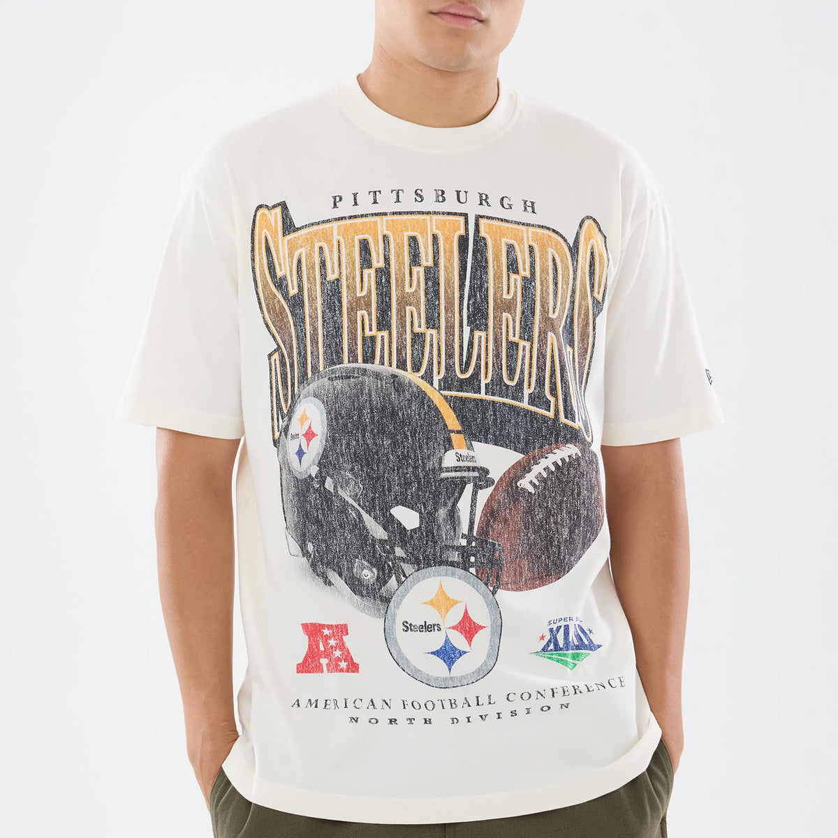 The model is wearing this NFL Sport Classic Pittsburgh Steelers T-Shirt in cream. 3