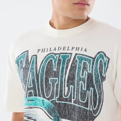 The model is wearing this NFL Sport Classic Philadelphia Eagles T-Shirt in cream. 4