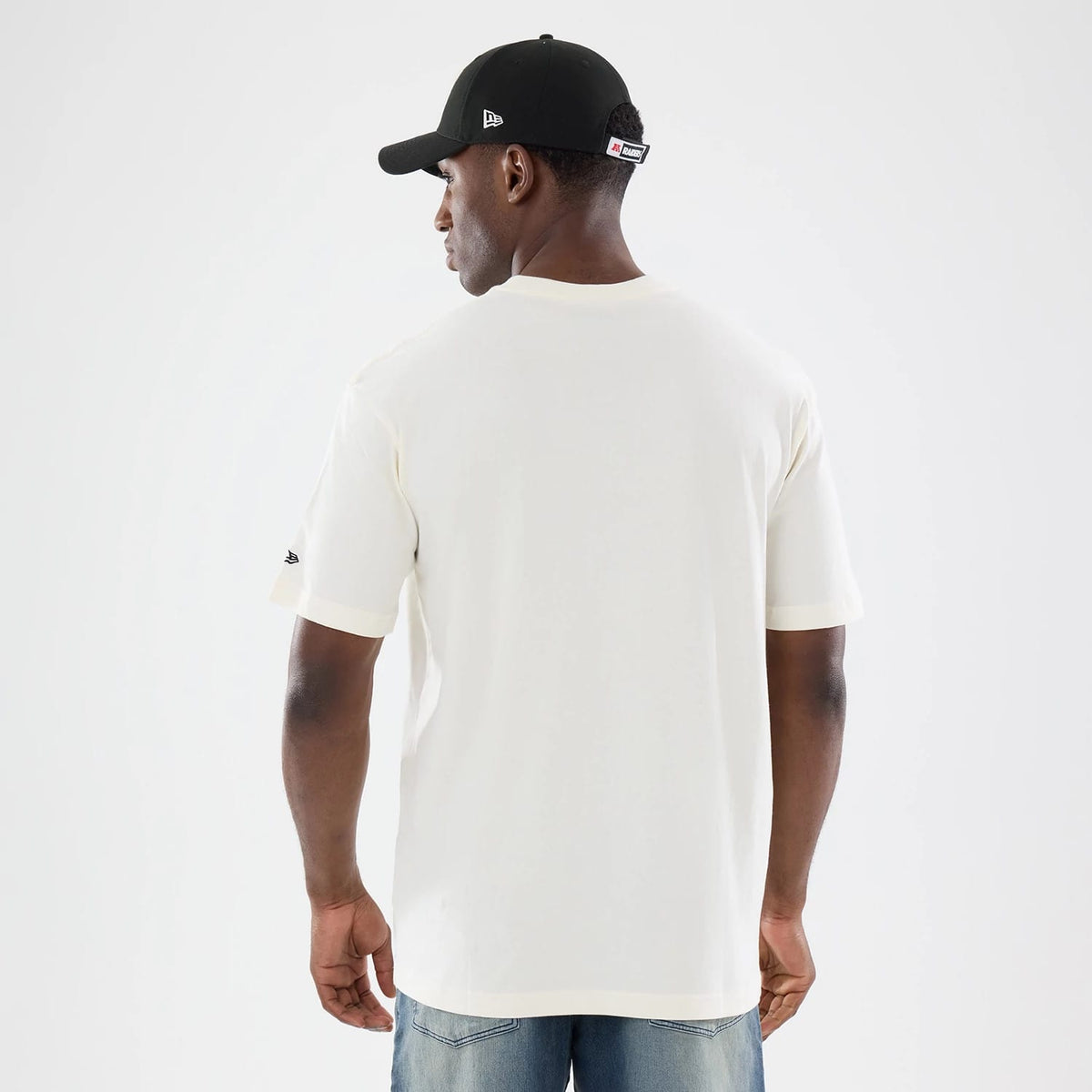 The model is wearing this NFL Sport Classic Las Vegas Raiders T-Shirt in cream. 2