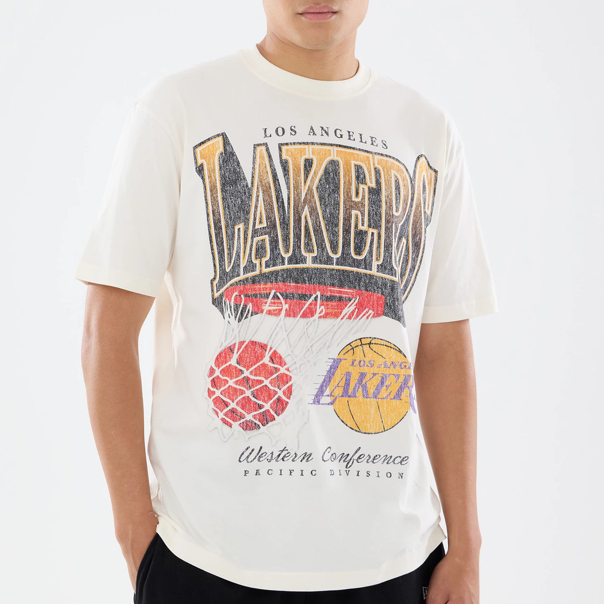 New Era LA Lakers NBA Sport Classic Cream T-Shirt, front view showing a large Lakers graphic with a basketball net design, Los Angeles Lakers lettering prominently displayed above, and Western Conference Pacific Division text at the bottom.