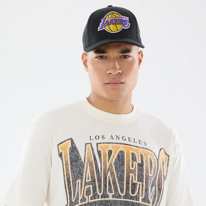 The model is wearing this NBA Sport Classic LA Lakers T-Shirt in cream. 6