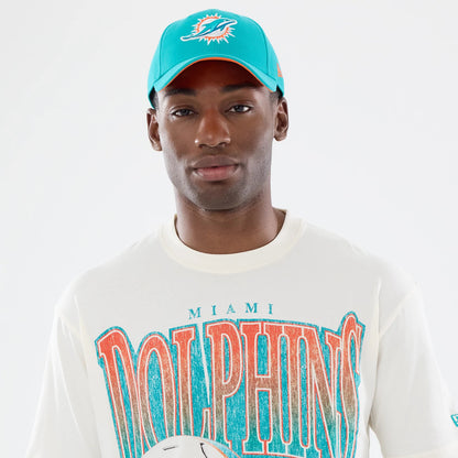 The model is wearing this NFL Sport Classic Miami Dolphins T-Shirt in cream. 6