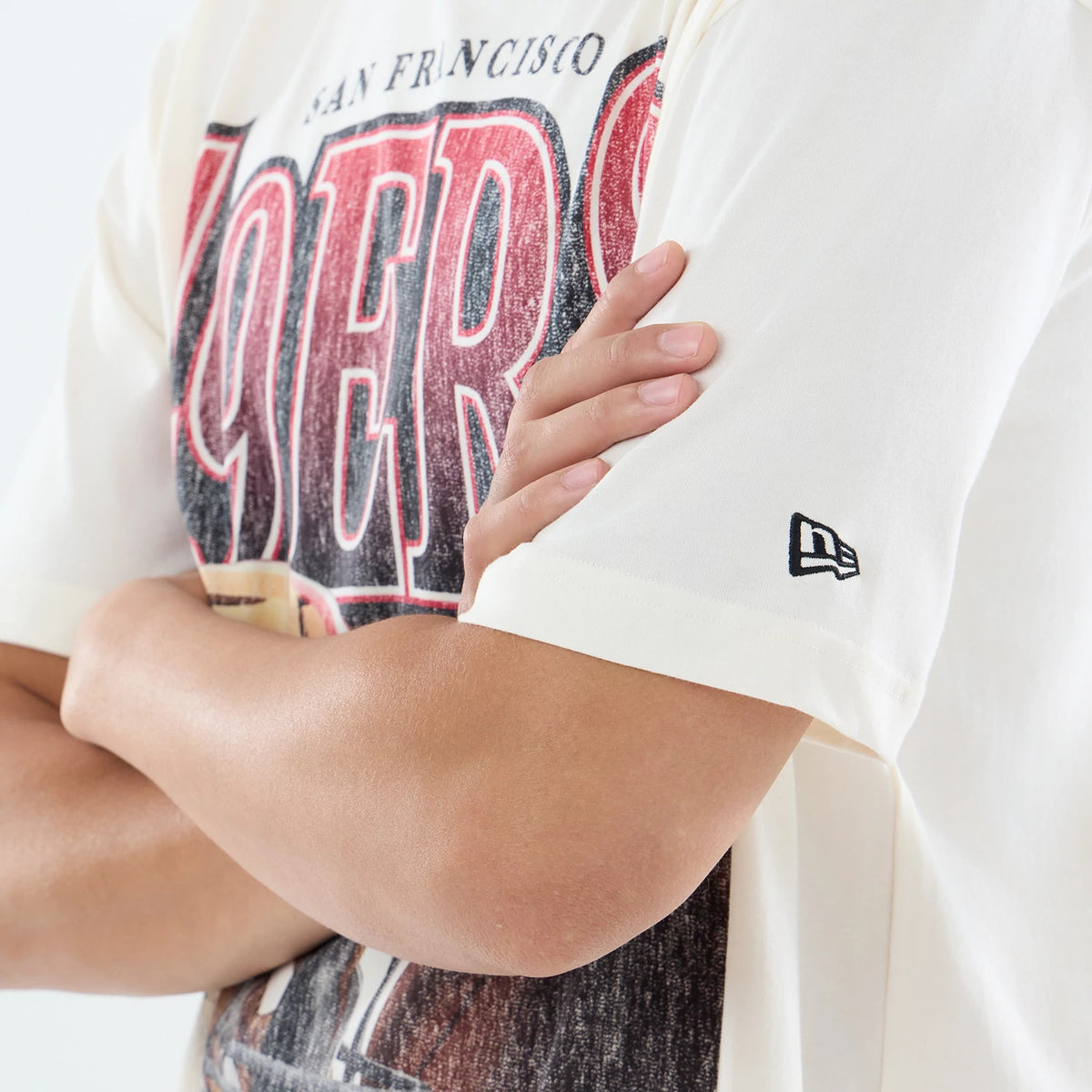 The model is wearing this NFL Sport Classic San Francisco 49ers T-Shirt in cream. 4