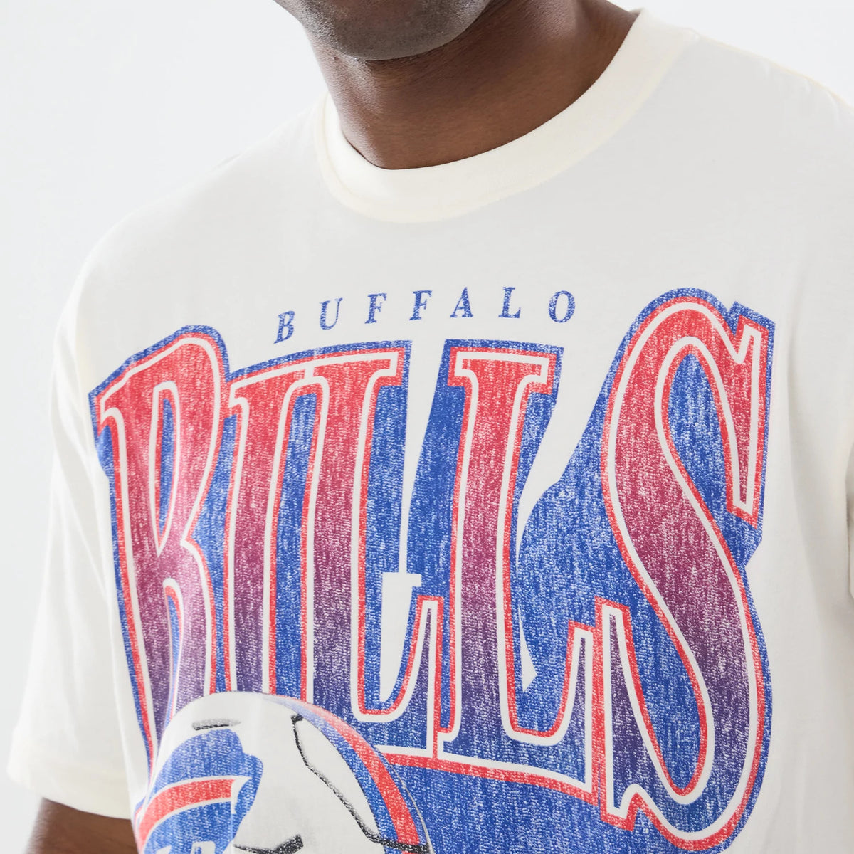 The model is wearing this NFL Sport Classic Buffalo Bills T-Shirt in Cream. 4