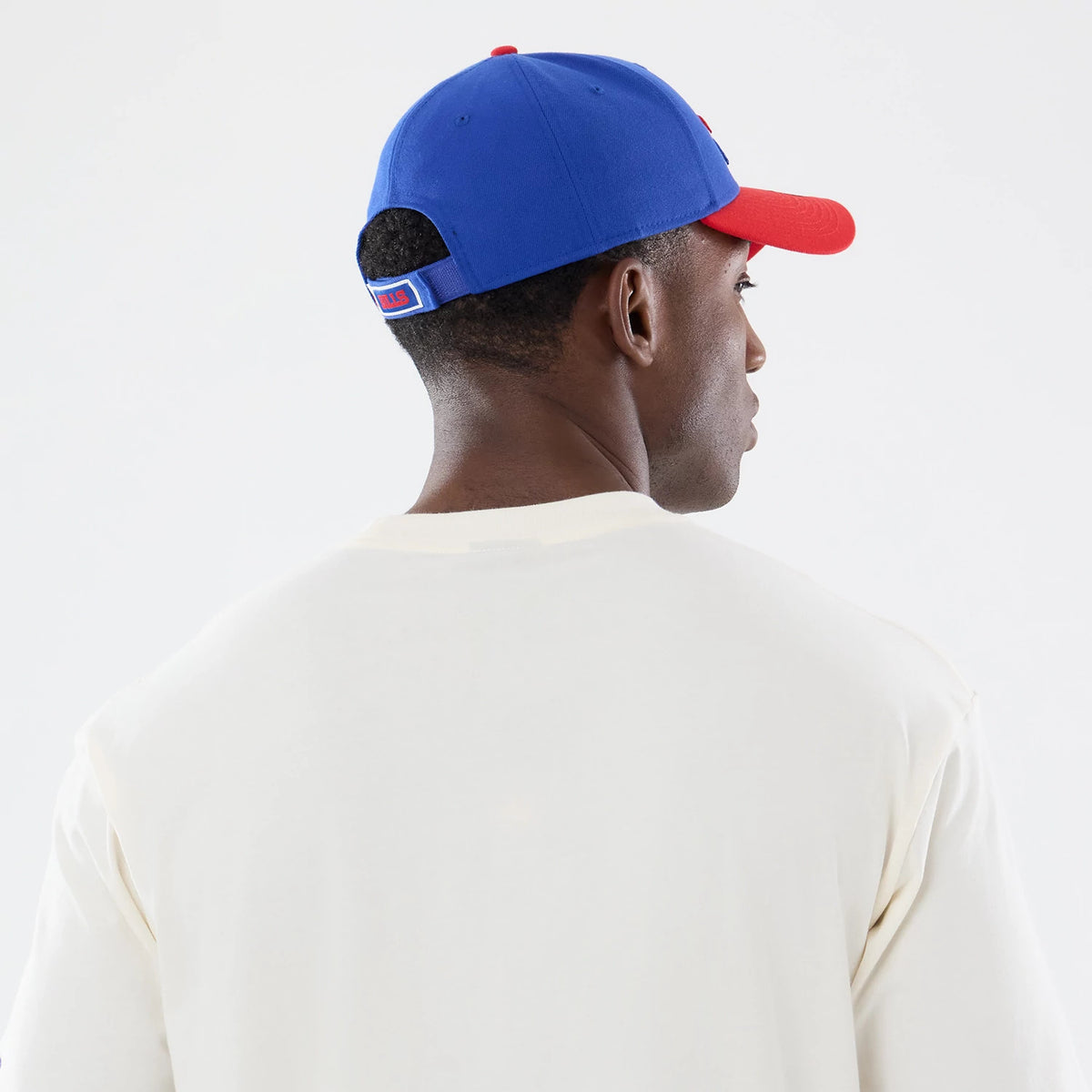 The model is wearing this NFL Sport Classic Buffalo Bills T-Shirt in Cream. 7