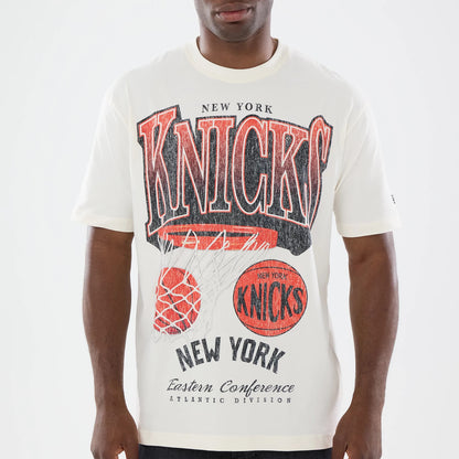 New Era New York Knicks NBA Sport Classic Cream T-Shirt, front view on-model showing red and black Knicks lettering with vintage-style graphic of a basketball and hoop, New York Eastern Conference text.