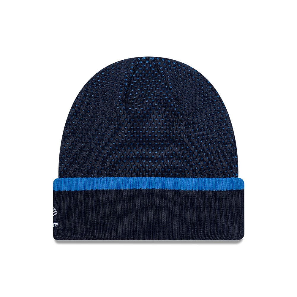 New Era Williams Team Navy Cuff Knit Beanie Hat, front view showing a navy knit design, a contrasting light blue band around the cuff, and the white embroidered New Era flag logo on the left side of the cuff.