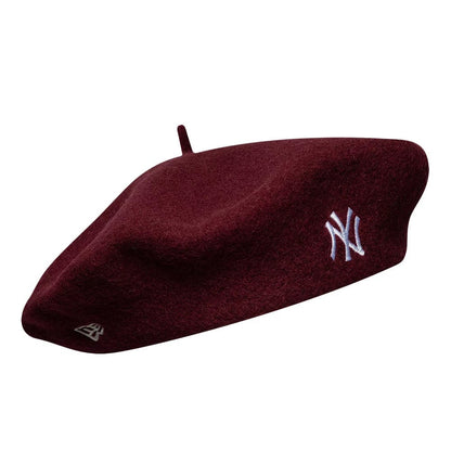 Pictured is this MLB Wool Script New York Yankees Beret in dark red. 3