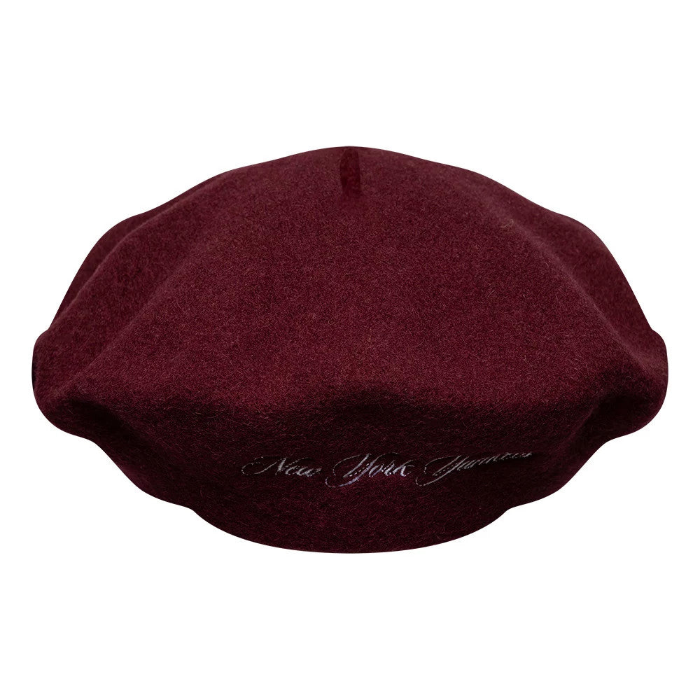 New Era New York Yankees MLB Wool Script Dark Red Beret, front view showing white embroidered script reading New York Yankees across the front, with a classic round beret shape and a small top loop on the dark red wool fabric.