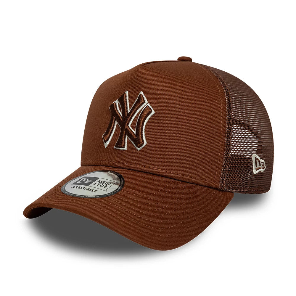 New York Yankees MLB Outline Brown New Era 9FORTY E-Frame Trucker Adjustable Cap, three-quarter view showing a brown structured crown with a raised brown and white NY logo embroidery on the front panel.