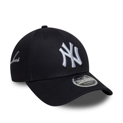 Pictured is this MLB Side Script New York Yankees 9FORTY M-Crown cap in navy. 1