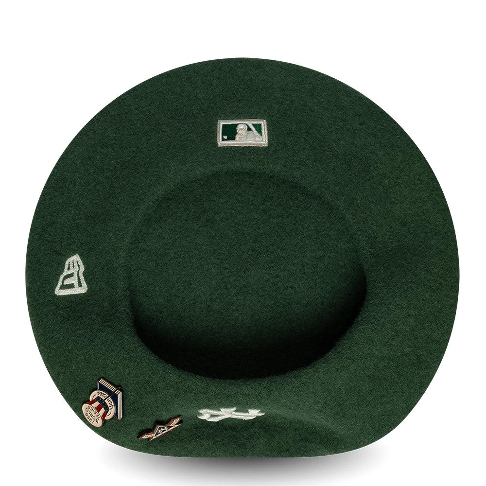 Pictured is this MLB Cooperstown Pin New York Yankees Beret in dark green. 5