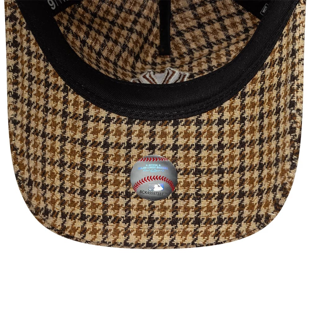 Pictured is this MLB Check New York Yankees 9TWENTY A-Frame cap in beige. 5