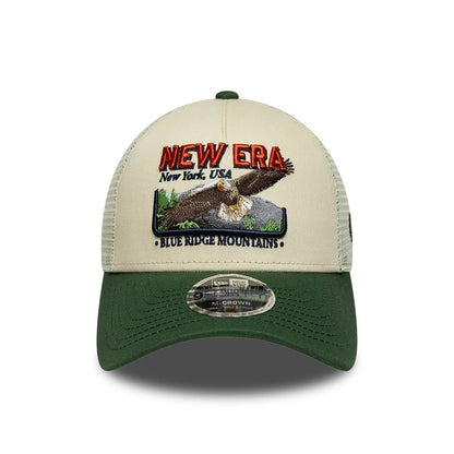 Pictured is this New Era Graphic 9FORTY M-Crown A-Frame Trucker cap in cream. 2