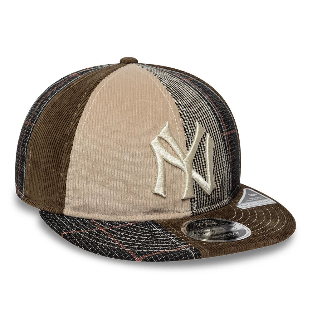 Yankees MLB Patchwork Dark Brown Retro Crown New Era 9FIFTY Adjustable Cap, three-quarter view showing raised cream NY embroidered logo on the textured tan and brown patchwork front panels, flat brown visor with 9FIFTY size sticker.