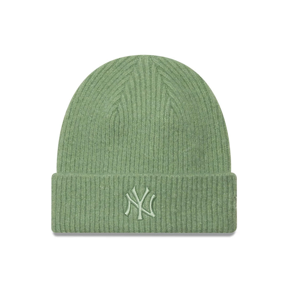 New Era New York Yankees Womens MLB Wide Pastel Green Cuff Knit Beanie Hat, front view showing the raised embroidered NY logo on the folded cuff, featuring a ribbed texture across the pastel green knit design.